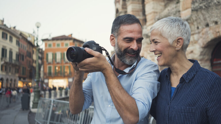 Mature couple as tourists in city Verona