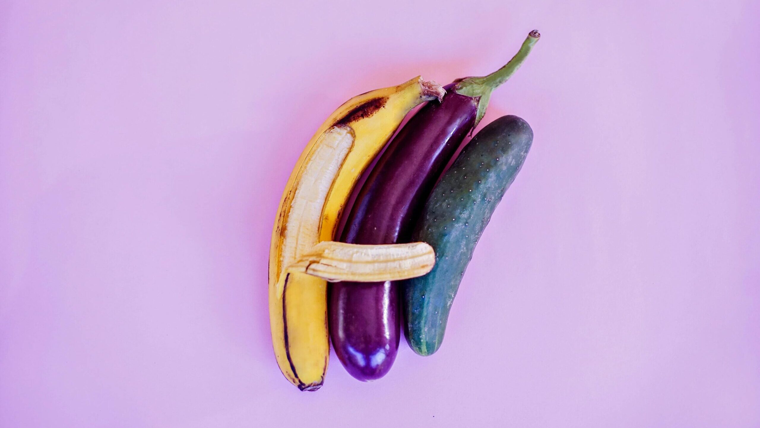 conceptual sex art showing three fruits laying together in an threesome