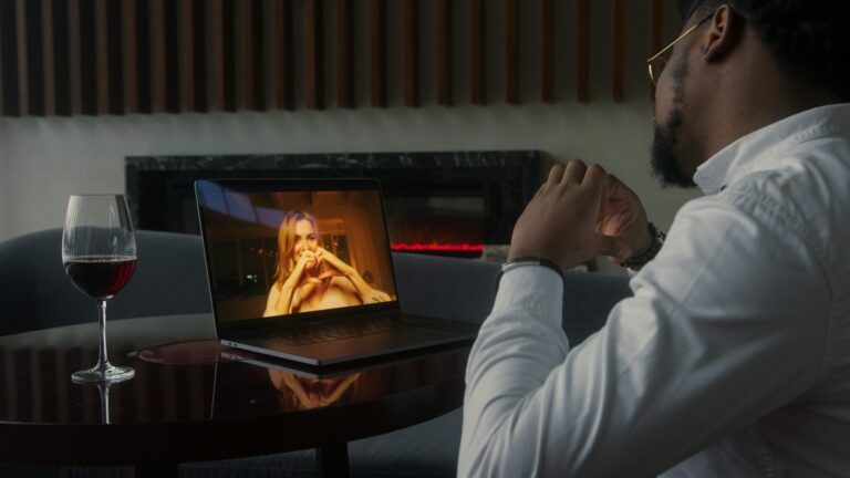 a couple on a video call through a lap top