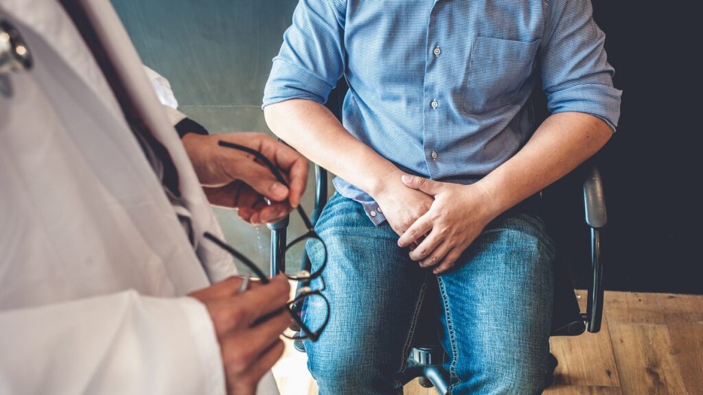 A doctor helping a patient seeking premature ejaculation treatment