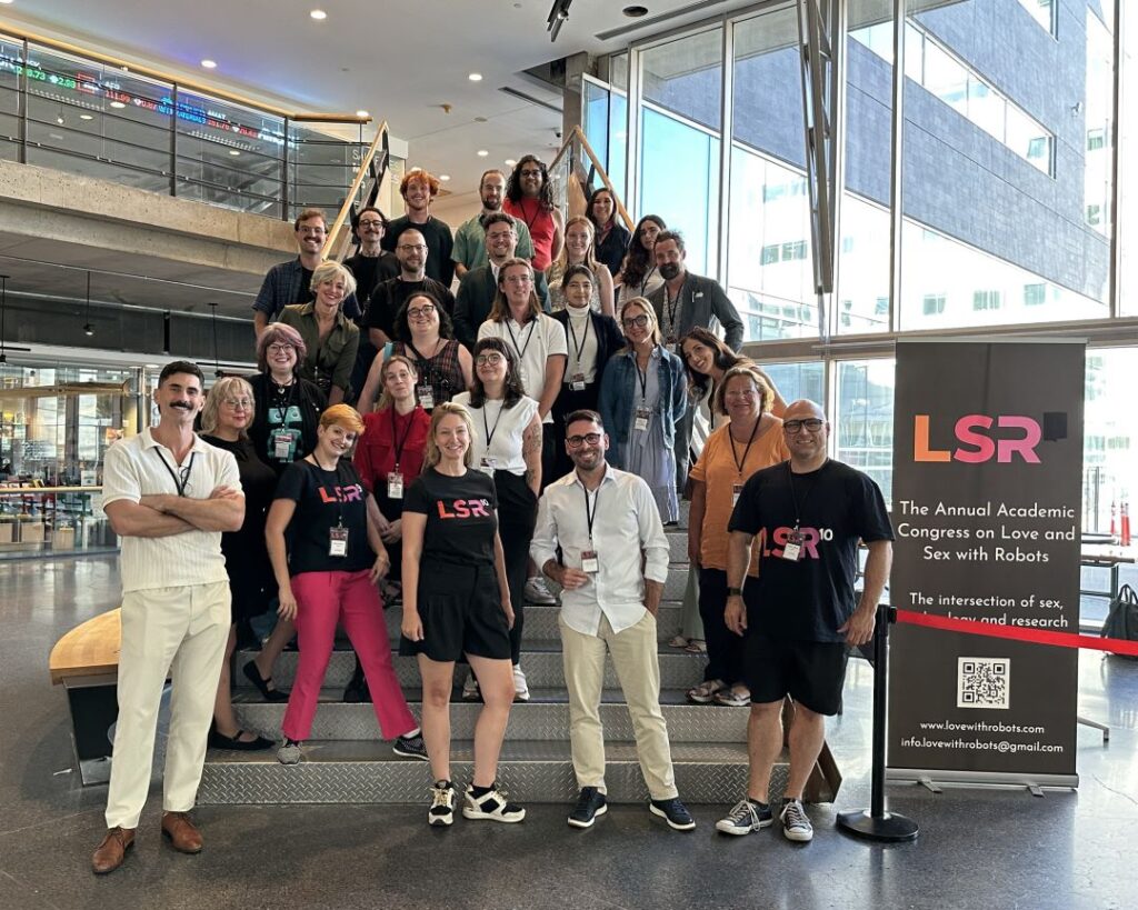 LSR 10 conference team and attendees on stairs